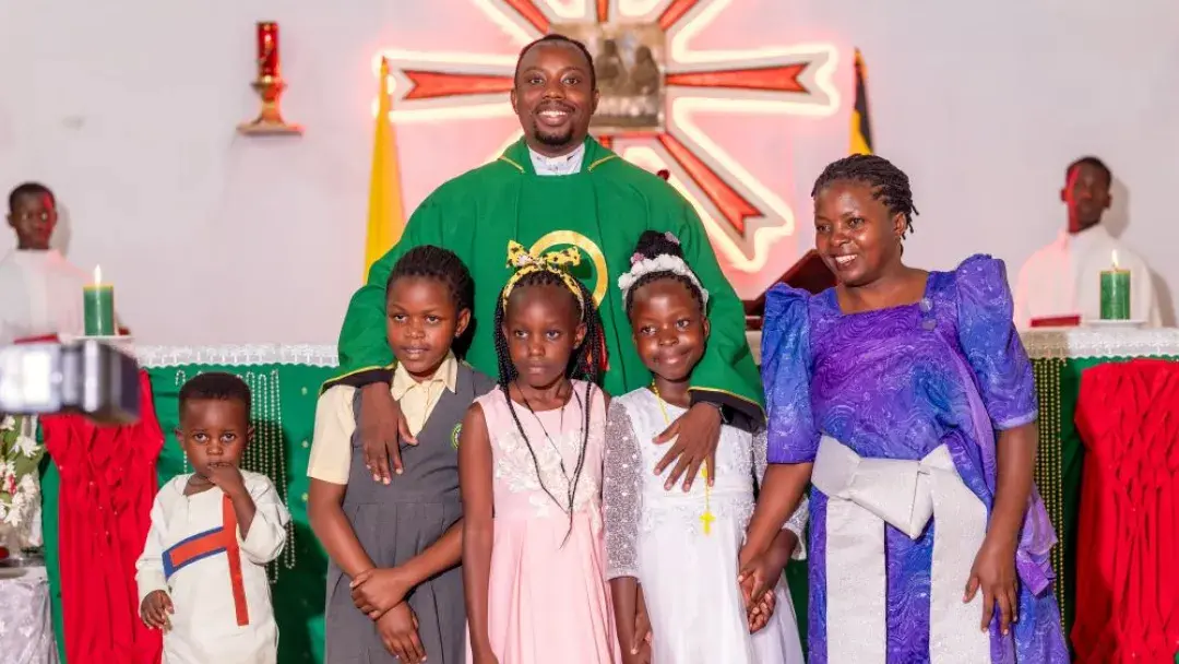 Family picture with priest