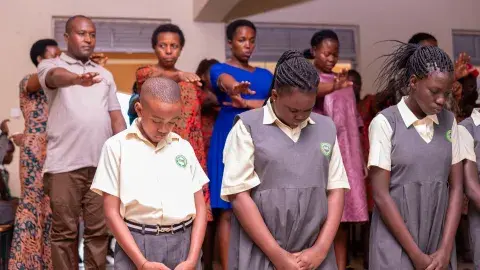 Parents praying for candidates