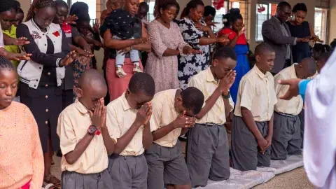 Parents praying for candidates