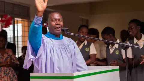 Rev. Kinene preaching