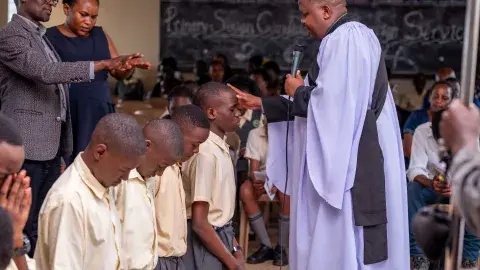 Rev. Noah dedicating candidates