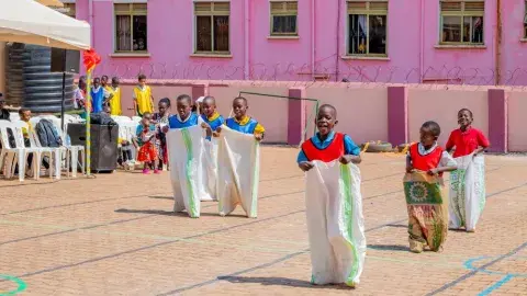 Sack race and button fixing